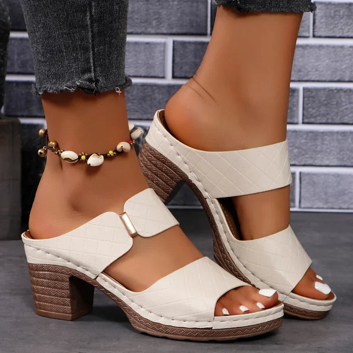 Chic Shara women's leather sandals with a stable block heel, essential summer footwear.