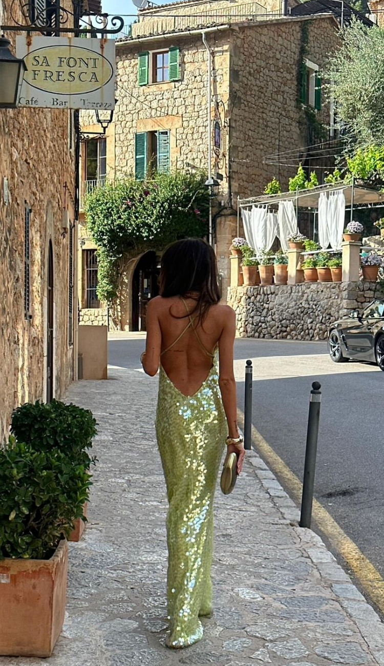 Dazzling women's green homecoming dress, backless and shimmering, an elegant formal gown for parties & proms.