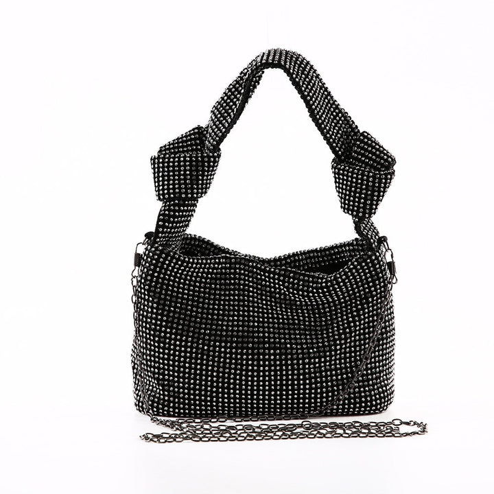 Sparkling rhinestone evening clutch for women. Dazzling metallic finish, ideal for formal events & parties.