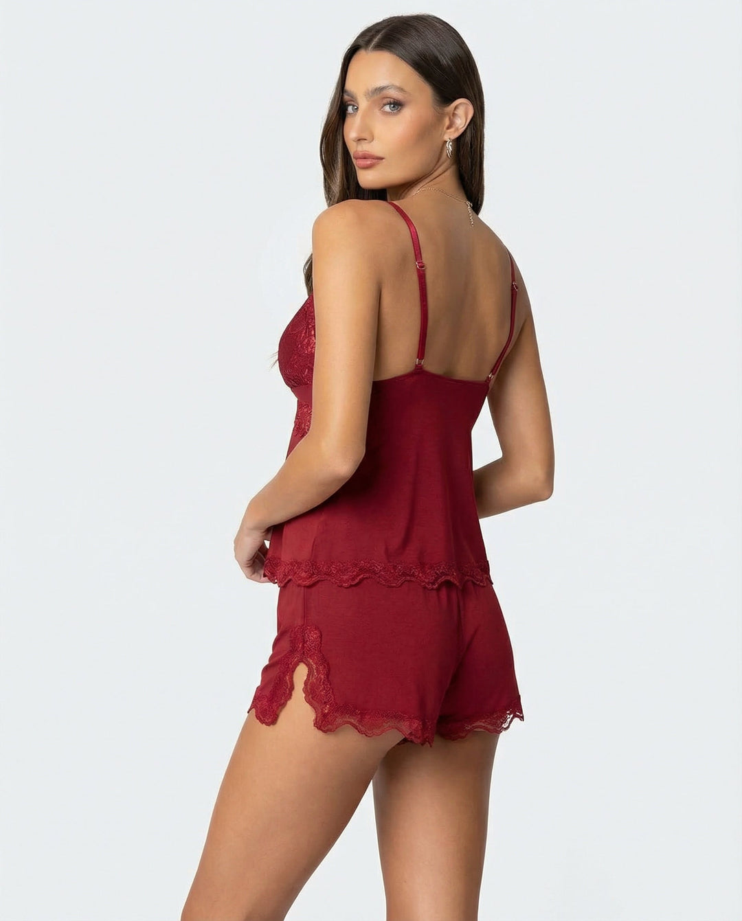 Elegant women's short lace nightwear set. Comfortable summer pajamas for relaxing at home.