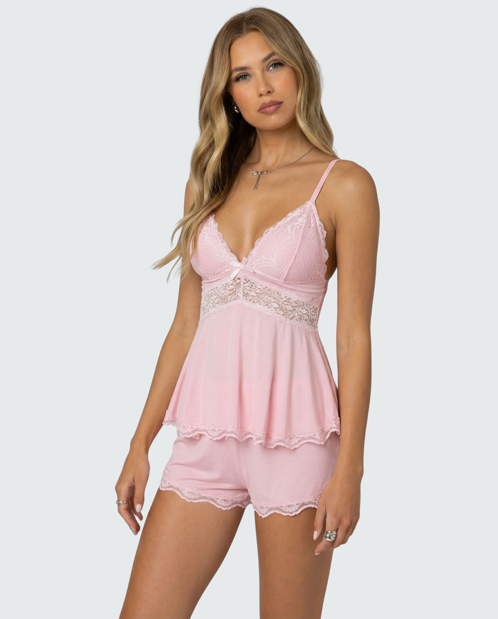 Short pajama set for women with beautiful lace accents. Lightweight and comfortable for summer sleep.