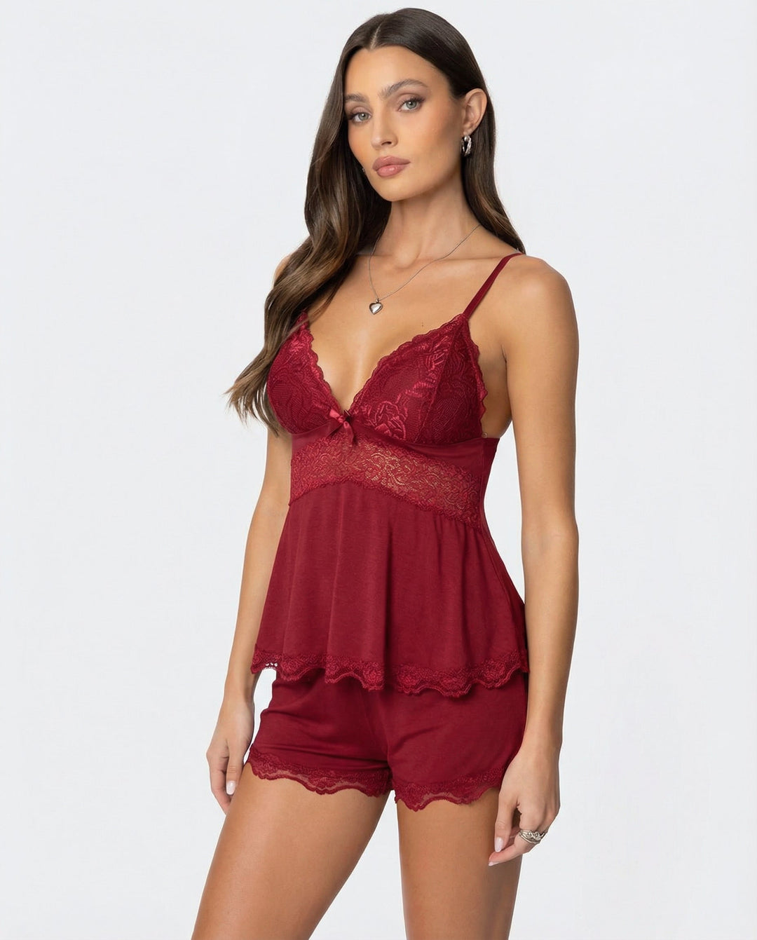 Complete women's short pajama set with delicate lace details. Comfortable and stylish sleepwear.