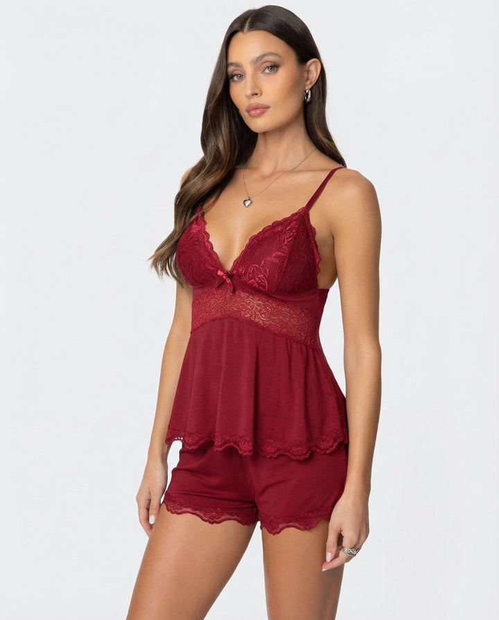 Complete women's short pajama set with delicate lace details. Comfortable and stylish sleepwear.