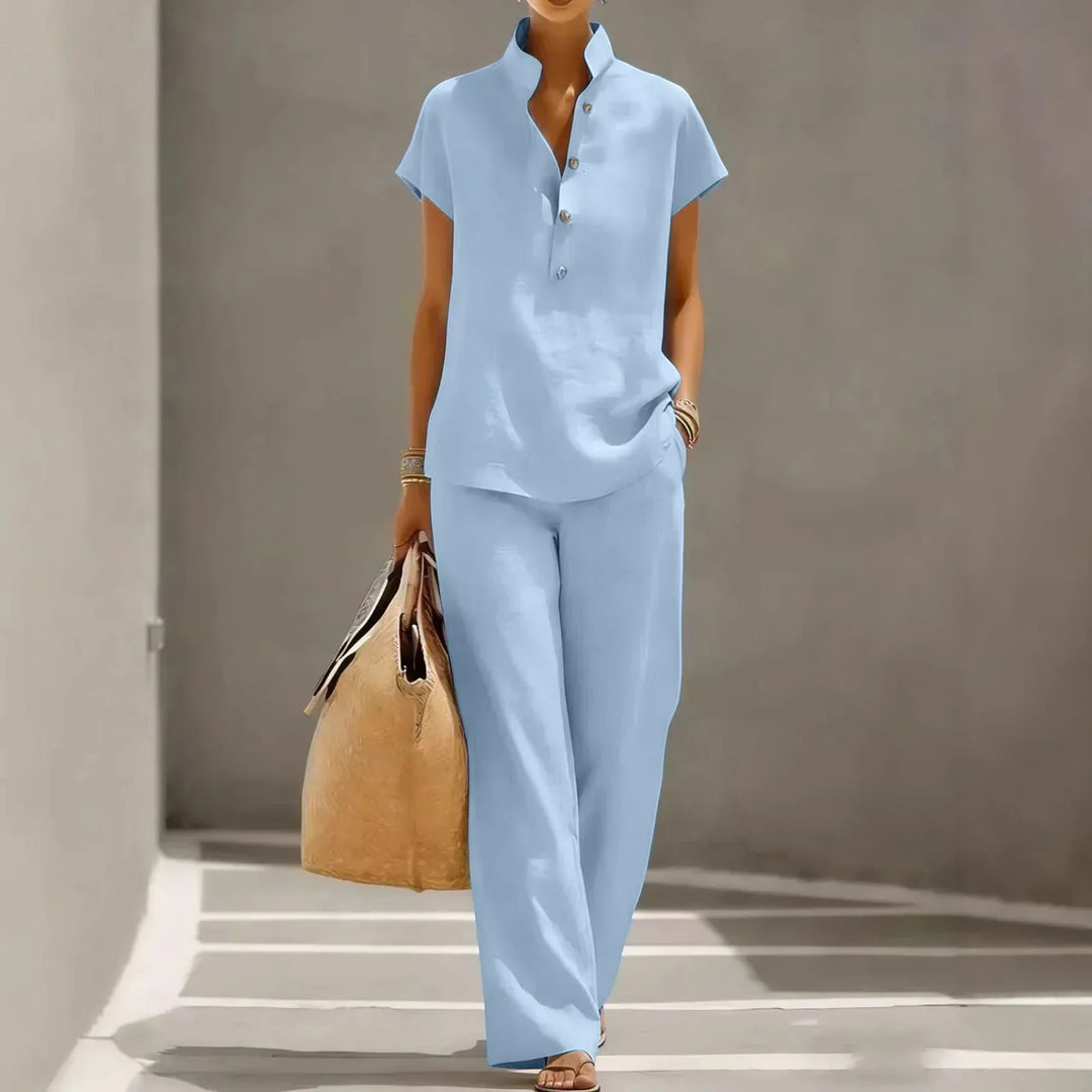 Women's short sleeve two-piece lounge set, perfect for summer resort wear, featuring wide-leg pants & comfy top.