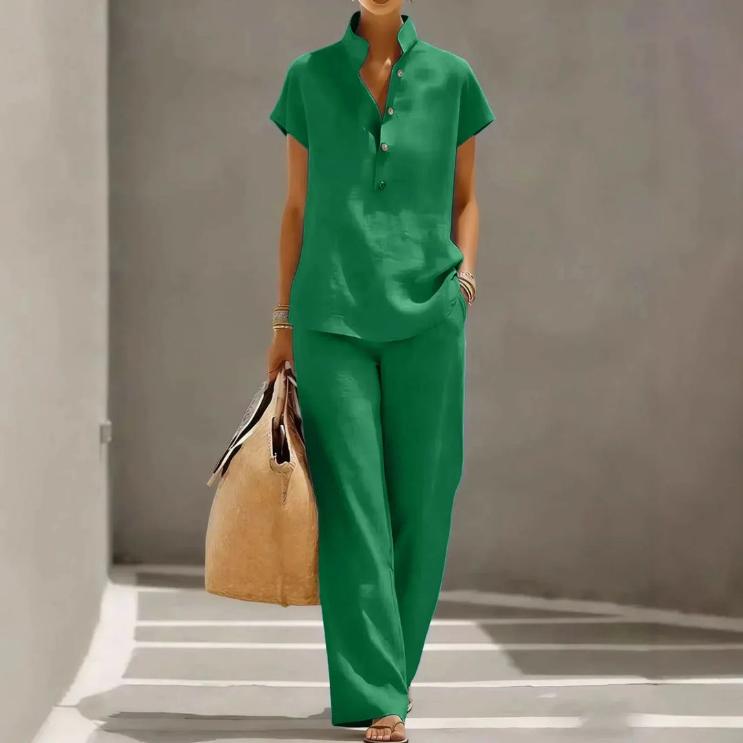 Comfortable women's short sleeve top & wide-leg pants two-piece lounge set, perfect for casual summer days.