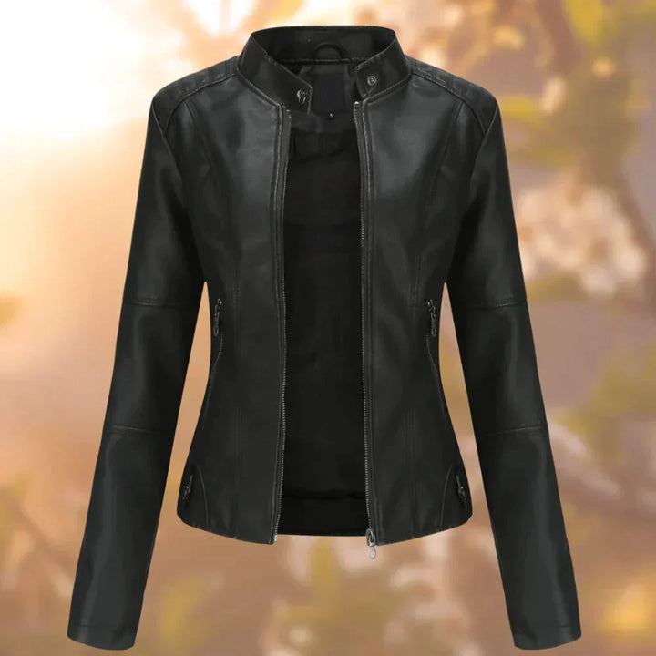 Women's sleek black biker jacket, edgy style for versatile outerwear. Perfect casual fashion statement piece.