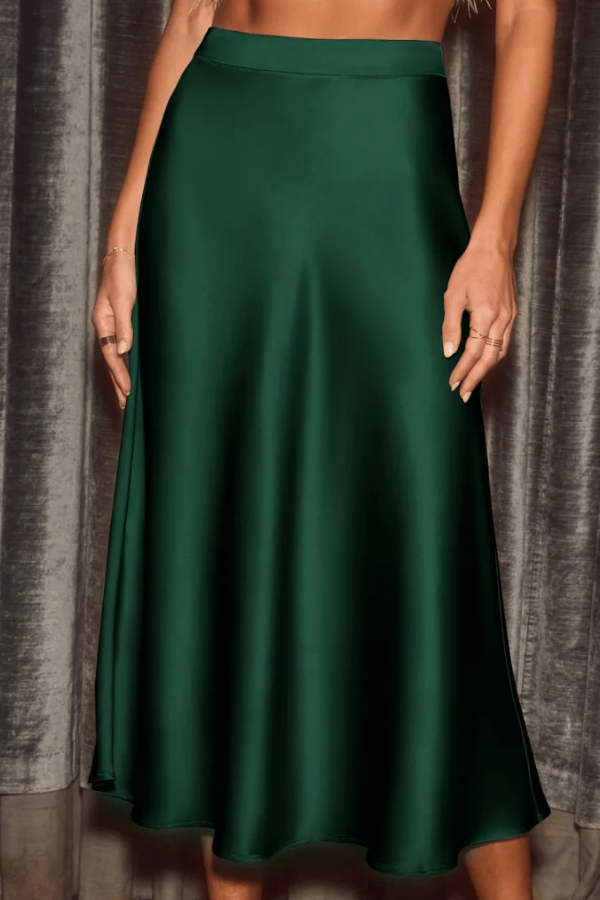 Flowy women's midi skirt in A-line silhouette, perfect for effortless style. Versatile high-rise long skirt.