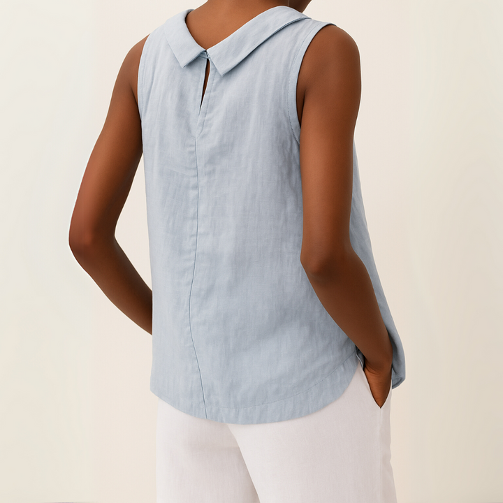 Versatile women's sleeveless blouse, minimalist design with a round neck. Great for everyday chic outfits.