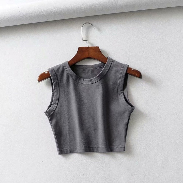 Fitted women's crop top, sleeveless design. Lightweight & perfect for active summer casual wear.