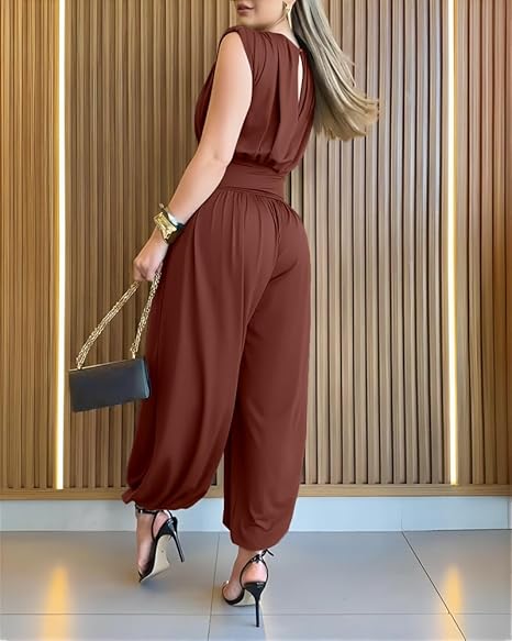 Sleek women's one-piece sleeveless romper, cinched high waist, and dramatic balloon legs for a stylish look.