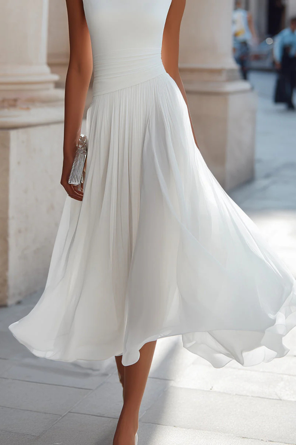 Flowy women's sleeveless midi dress, A-line silhouette. Comfortable & stylish for summer vacations or casual elegance.