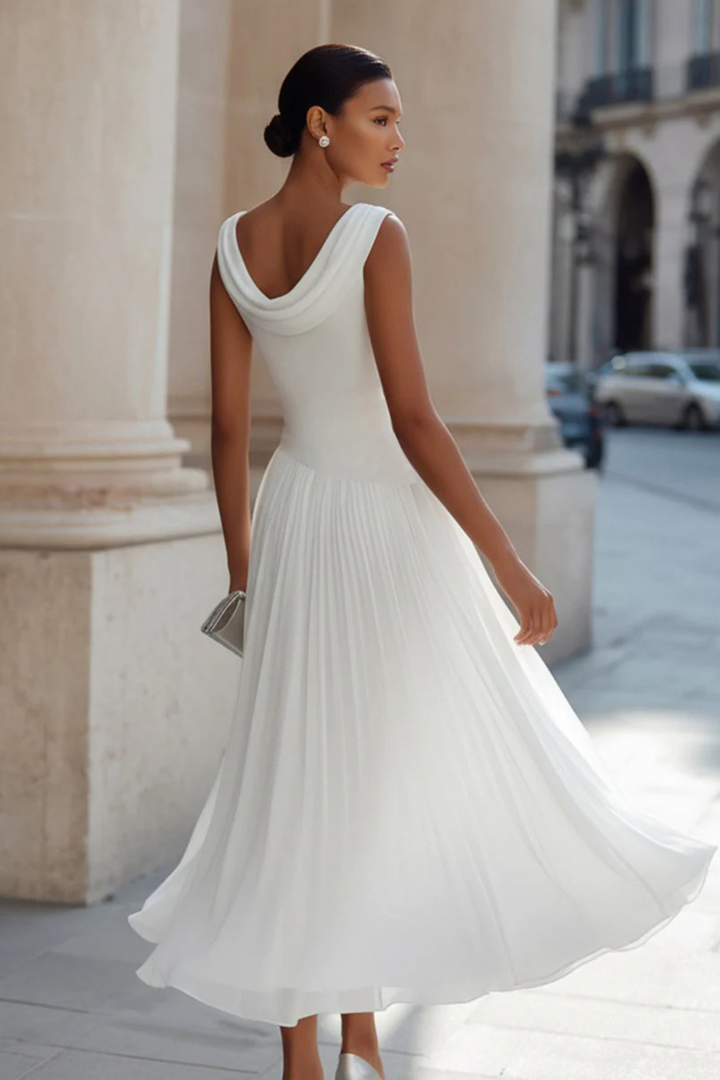 Stylish women's sleeveless midi dress. A-line cut, perfect for elegant summer parties, formal events, or chic outings.