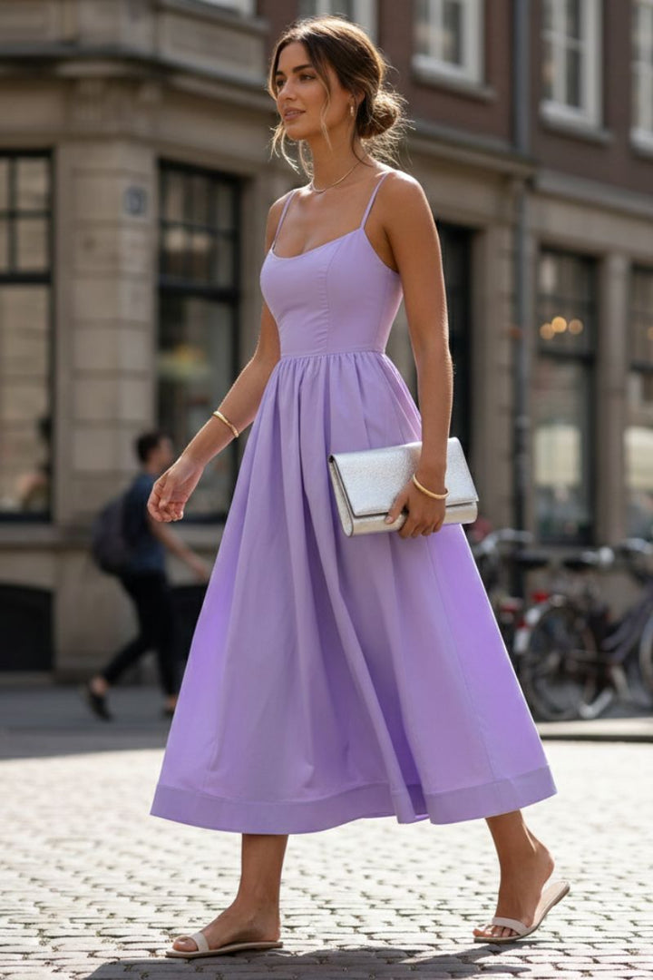 White women's sleeveless midi cocktail dress. Timeless scoop neck formal evening wear for weddings & parties.