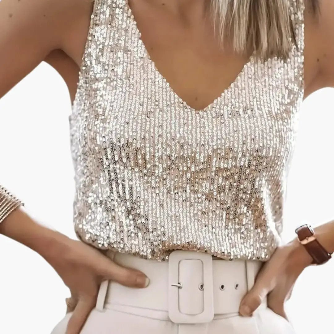 Sparkling women's sequin tank top with round neck. A versatile sleeveless top for party or casual elegant looks.