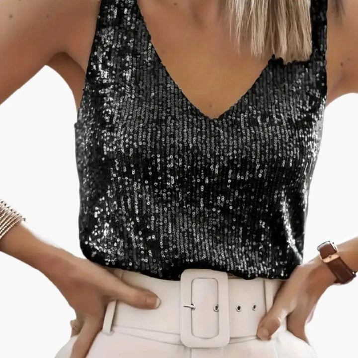 Glamorous women's sleeveless sequin top, round neck. Ideal for parties, summer nights, or layering.