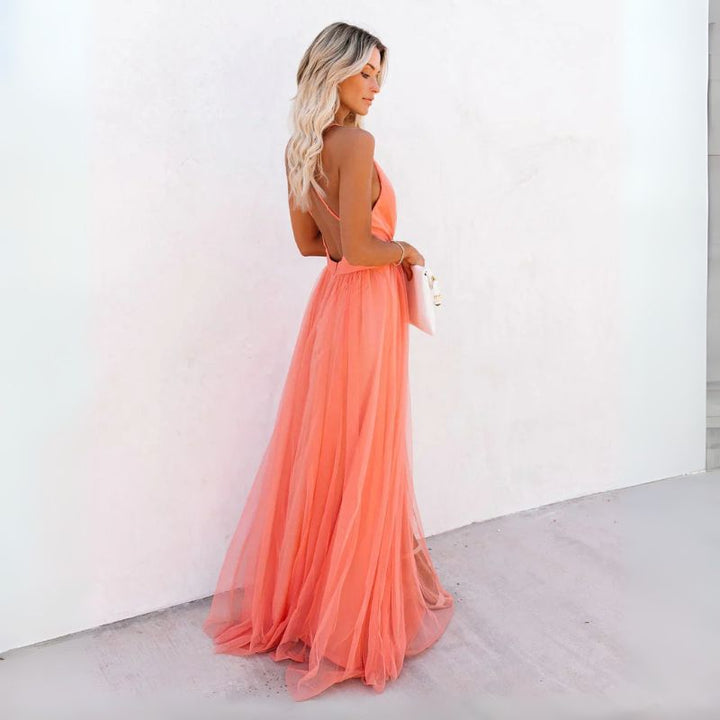 Graceful women's sleeveless V-neck maxi wedding guest dress, flattering silhouette for special occasions.