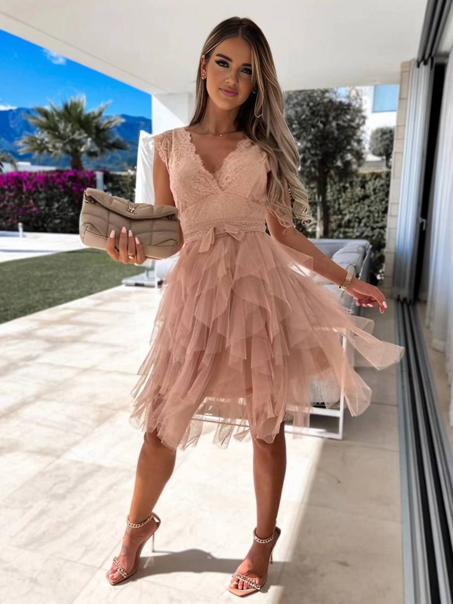 White women's sleeveless V-neck tutu dress. Perfect mini cocktail dress for elegant events.
