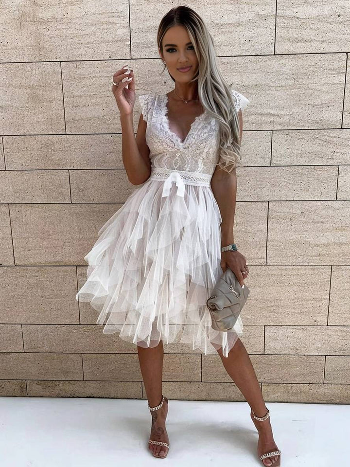 Women's formal sleeveless V-neck tutu mini dress. Ideal elegant party wear for various occasions.