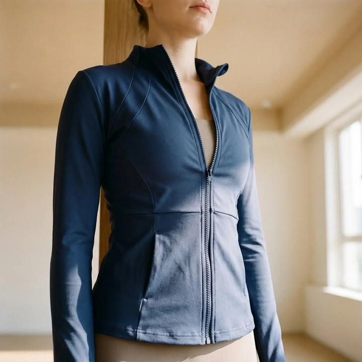 Women's slim-fit activewear jacket, perfect for running & gym workouts. Features moisture-wicking fabric.
