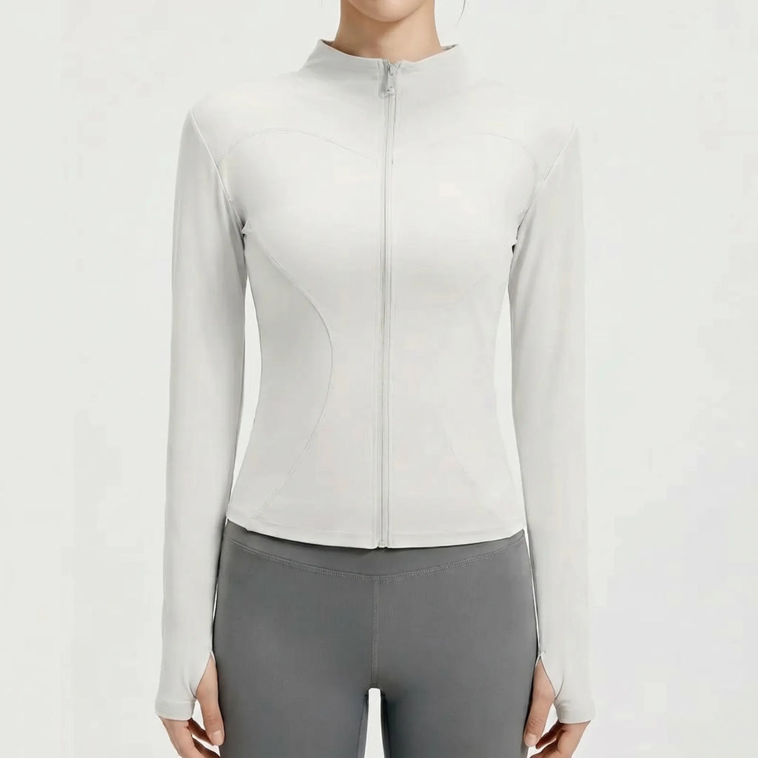 Versatile women's workout jacket, slim-fit athletic top for fitness, sports & outdoor activities.