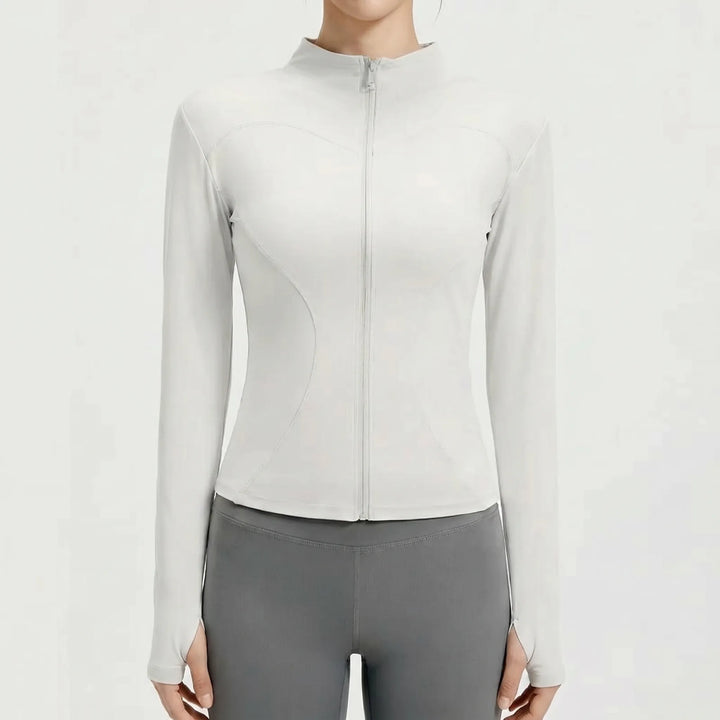 Versatile women's workout jacket, slim-fit athletic top for fitness, sports & outdoor activities.