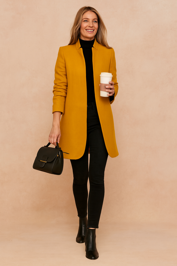 Stylish women's tailored coat. A slim fit, structured long-sleeve jacket for elegant fall & winter fashion.
