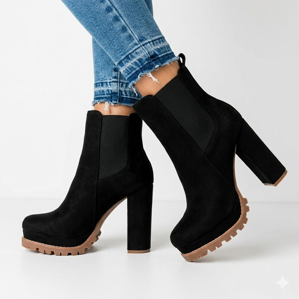 Women's slip-on ankle boots with platform & chunky block heel. Chic versatile fashion for fall/winter outfits.
