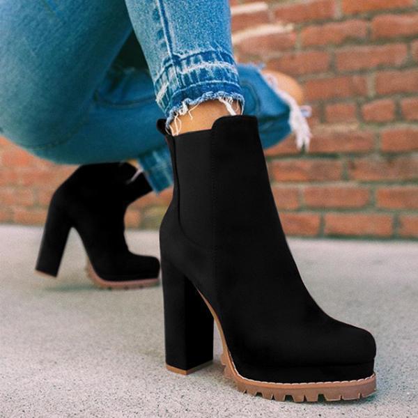 Leopard print slip-on women's ankle boots with platform & comfortable block heel. Versatile fall winter fashion.