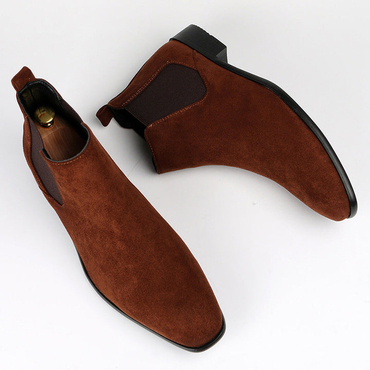 Women's slip-on Chelsea boots with a comfortable block heel, perfect for fall and winter fashion.