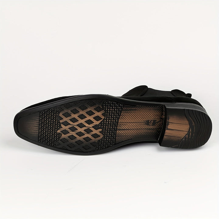 Elegant women's slip-on boots featuring a sturdy block heel and classic Chelsea ankle design for versatile styling.
