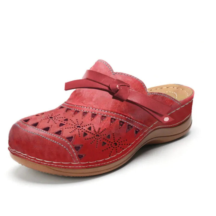 Fashionable women's backless clogs featuring a stylish bow, trendy cutouts, and an easy slip-on design.
