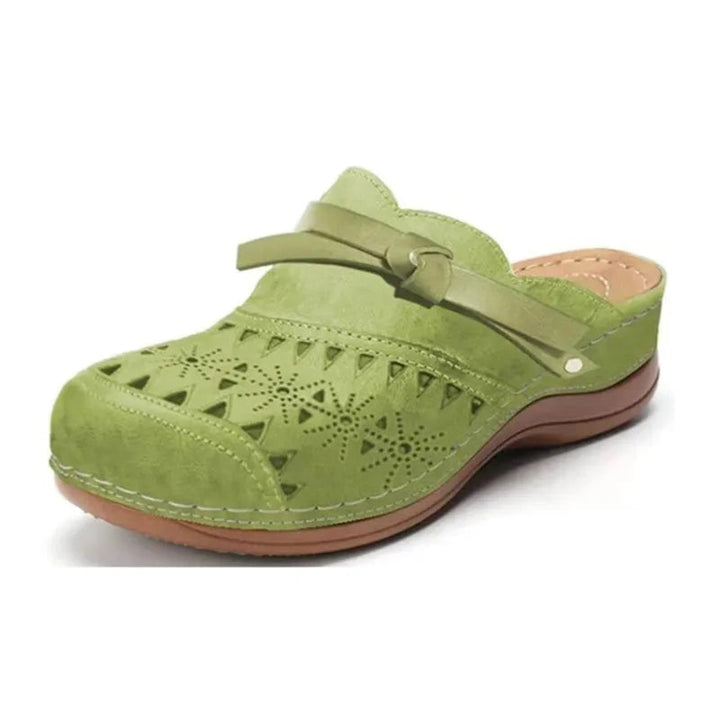 Comfortable women's casual sandals, slip-on clogs with a bow and cutout detail, ideal for summer fashion.