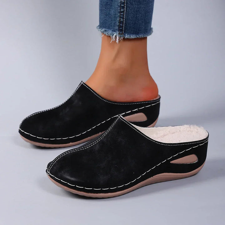 Stylish women's comfort clogs, slip-on casual footwear perfect for everyday fashion & all-day wear.