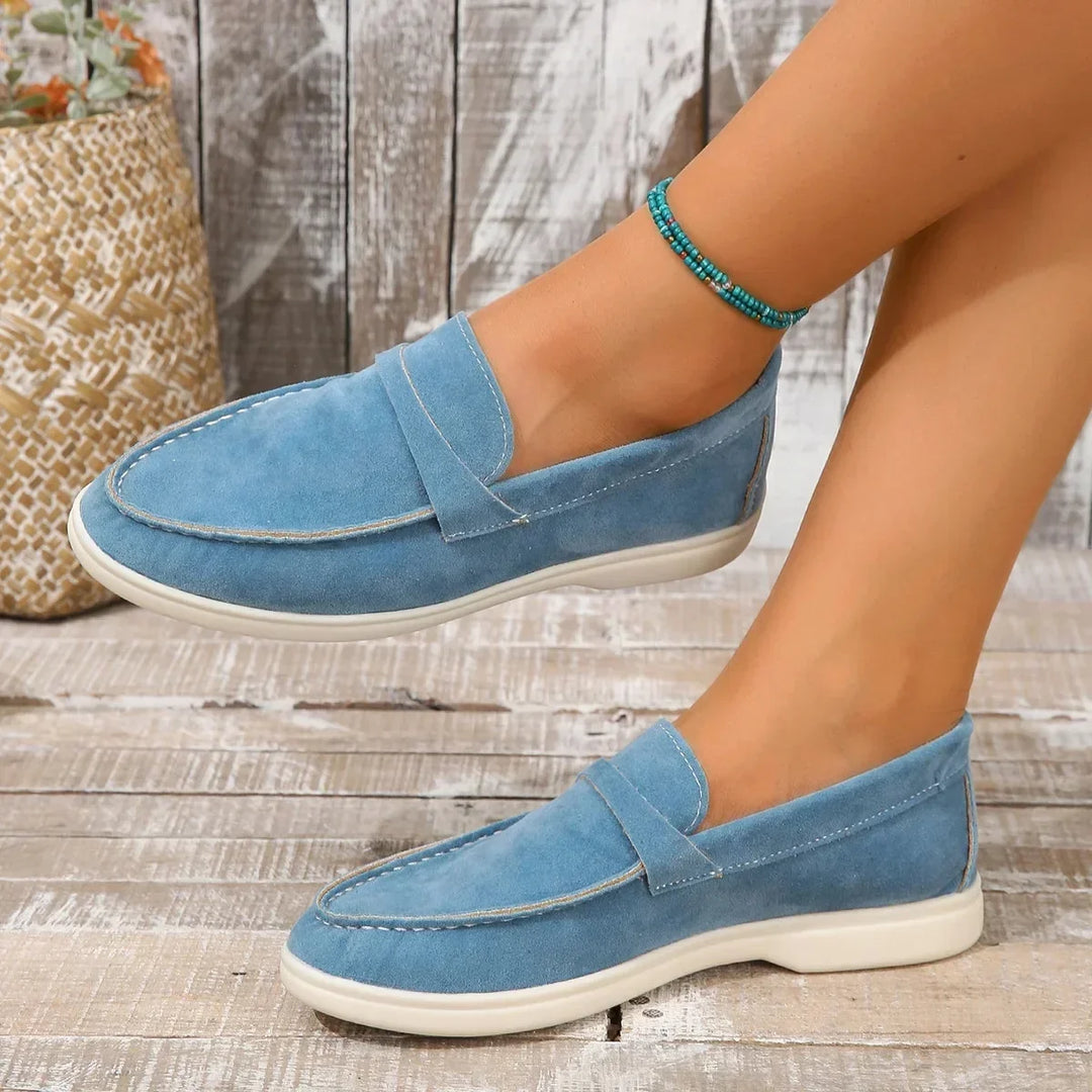 Fashionable women's slip-on flat loafers with cushioned support for comfortable office & casual walks.