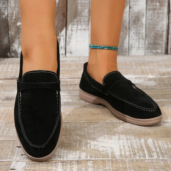 Side view: Women's slip-on loafers, sleek design & cushioned sole, ideal for office & casual comfort.