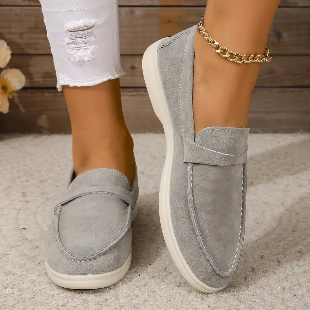 Comfortable women's slip-on flats, cushioned for all-day office & casual wear.
