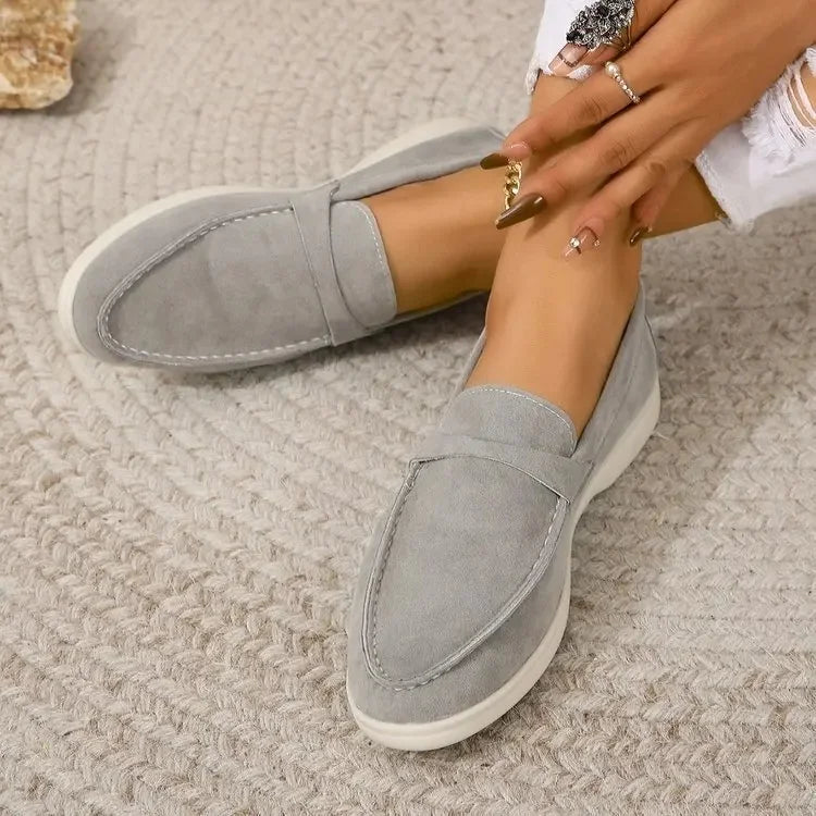 Stylish women's slip-on loafers, versatile for professional office & relaxed casual outfits.