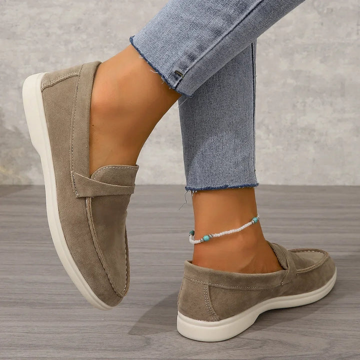 Easy slip-on women's loafers, cushioned for busy office days & casual outings.