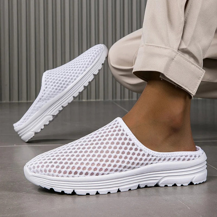 Women's slip-on orthopedic sneakers with arch support, perfect for comfortable walking and everyday wear.
