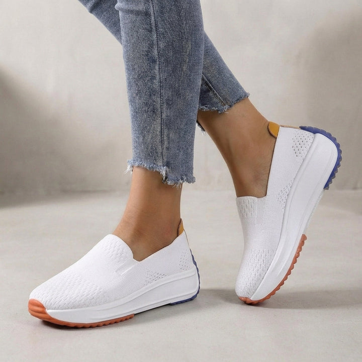 Stylish women's slip-on platform sneakers with orthopedic support, perfect for casual wear.