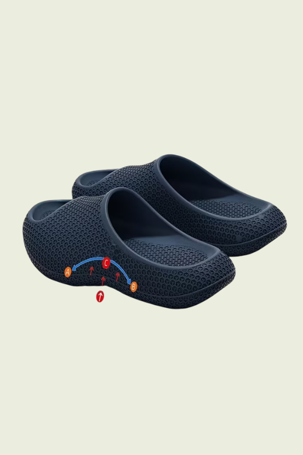 Indoor women's slip-on slippers, offering arch support & cushioned comfort for daily wear.