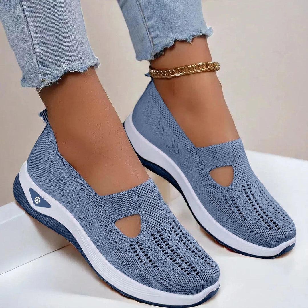 Durable women's slip-on walking sneakers with arch support, great for summer activities.