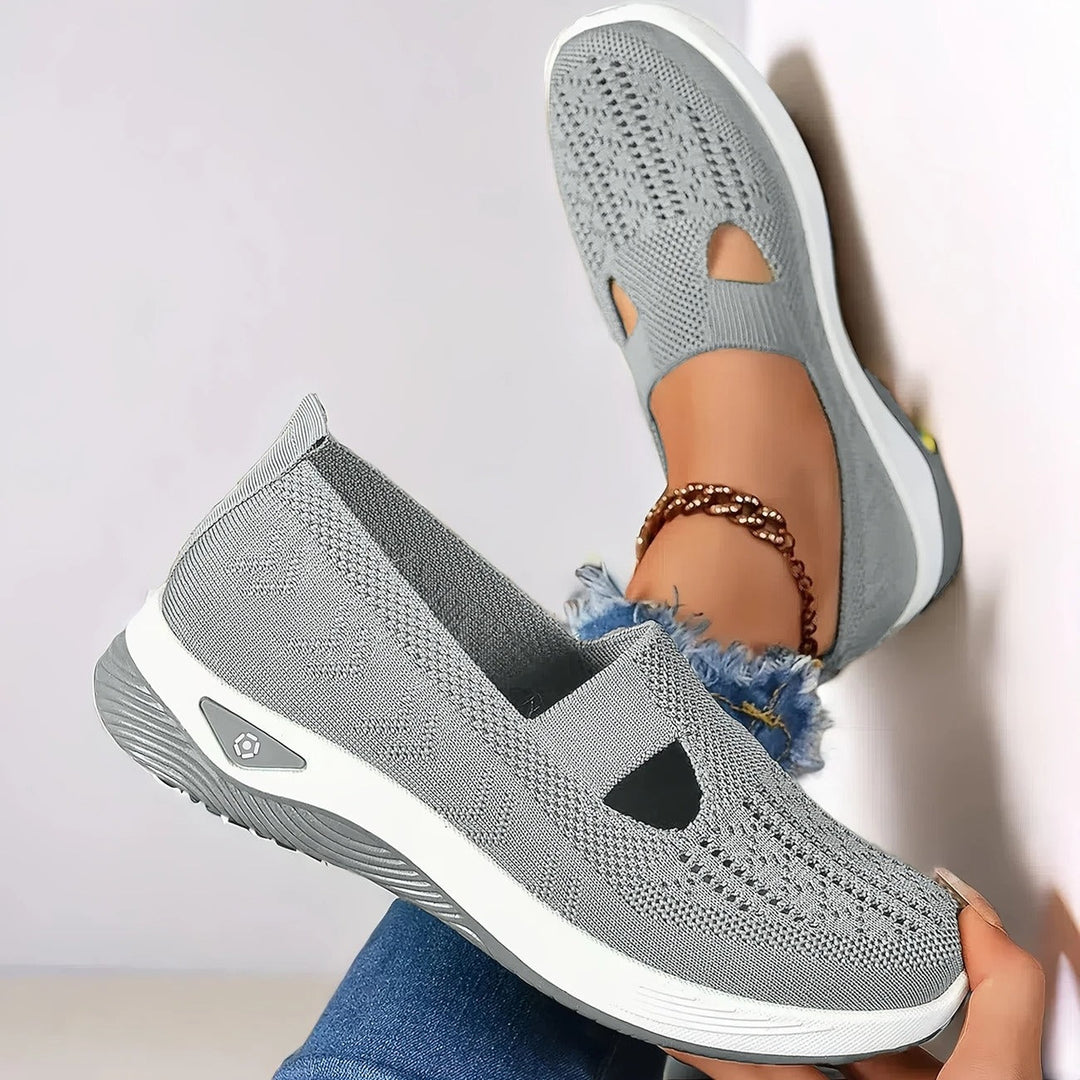 Comfortable women's slip-on walking shoes with strong arch support for everyday wear.