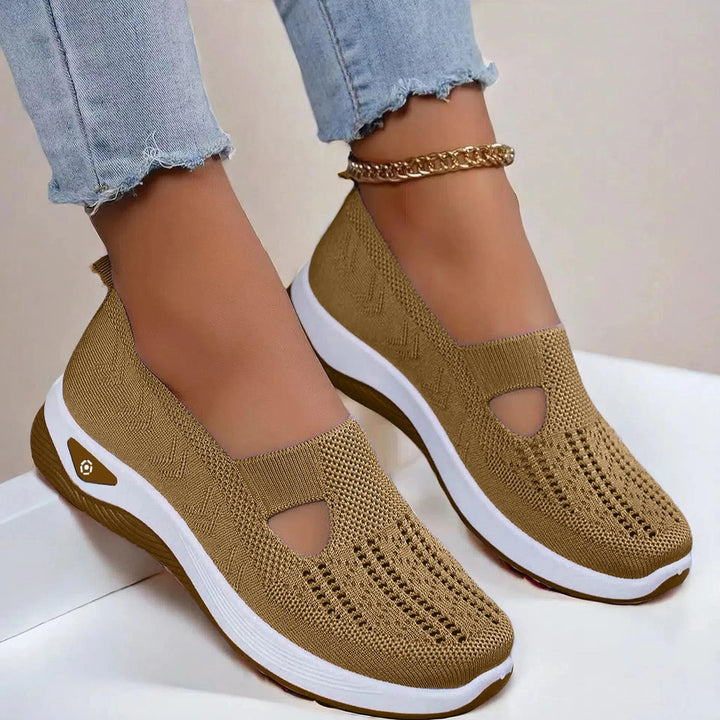 Breathable women's summer slip-on shoes with arch support, perfect for active wear.