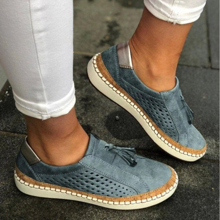 Lightweight women's athletic slip-on sneakers offering ultimate daily comfort and support for walking.