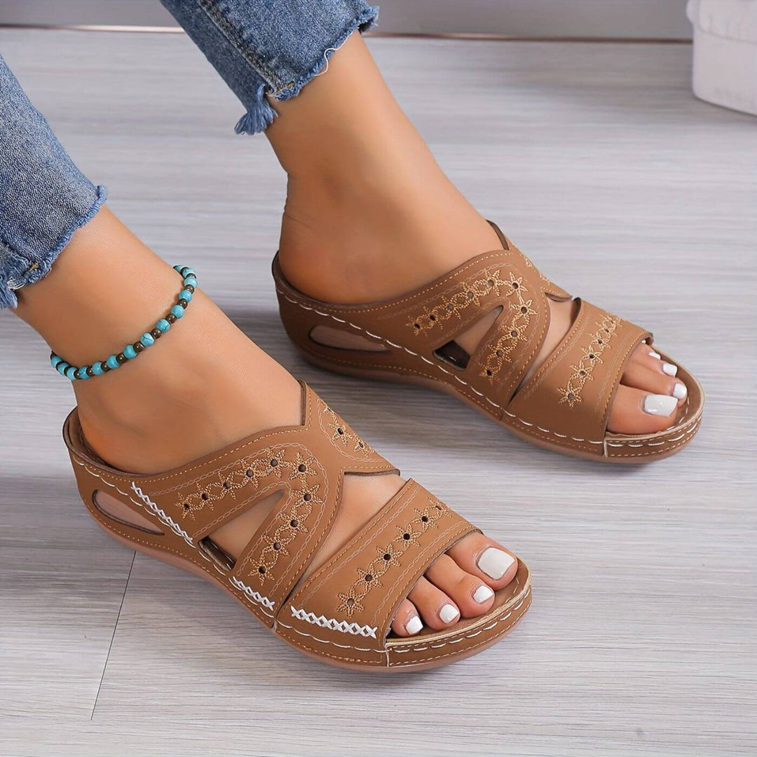 Orthopedic comfort footwear for women, designed with slip-resistant soles and foot support.