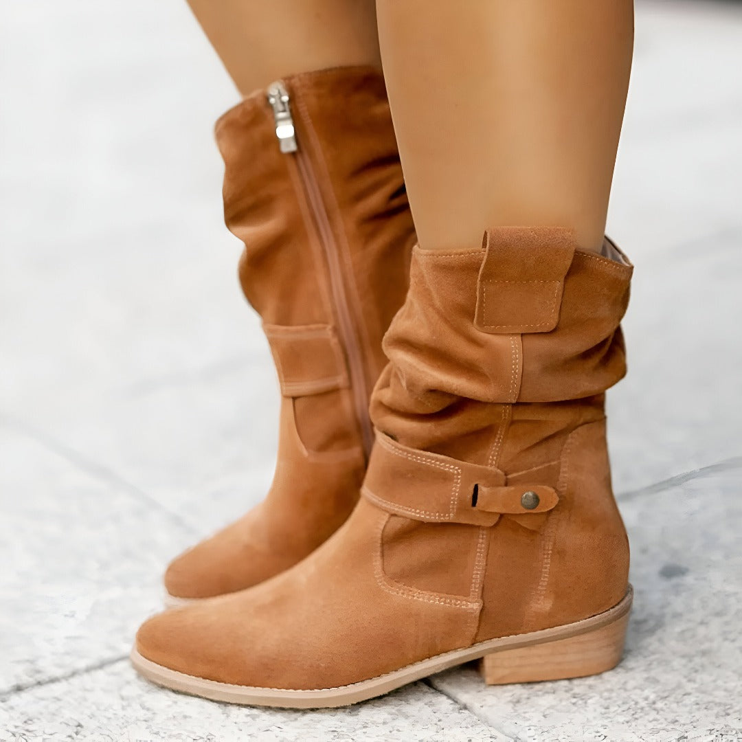 Fall fashion women's slouchy ankle boots. Casual style with a low heel & decorative buckle strap.