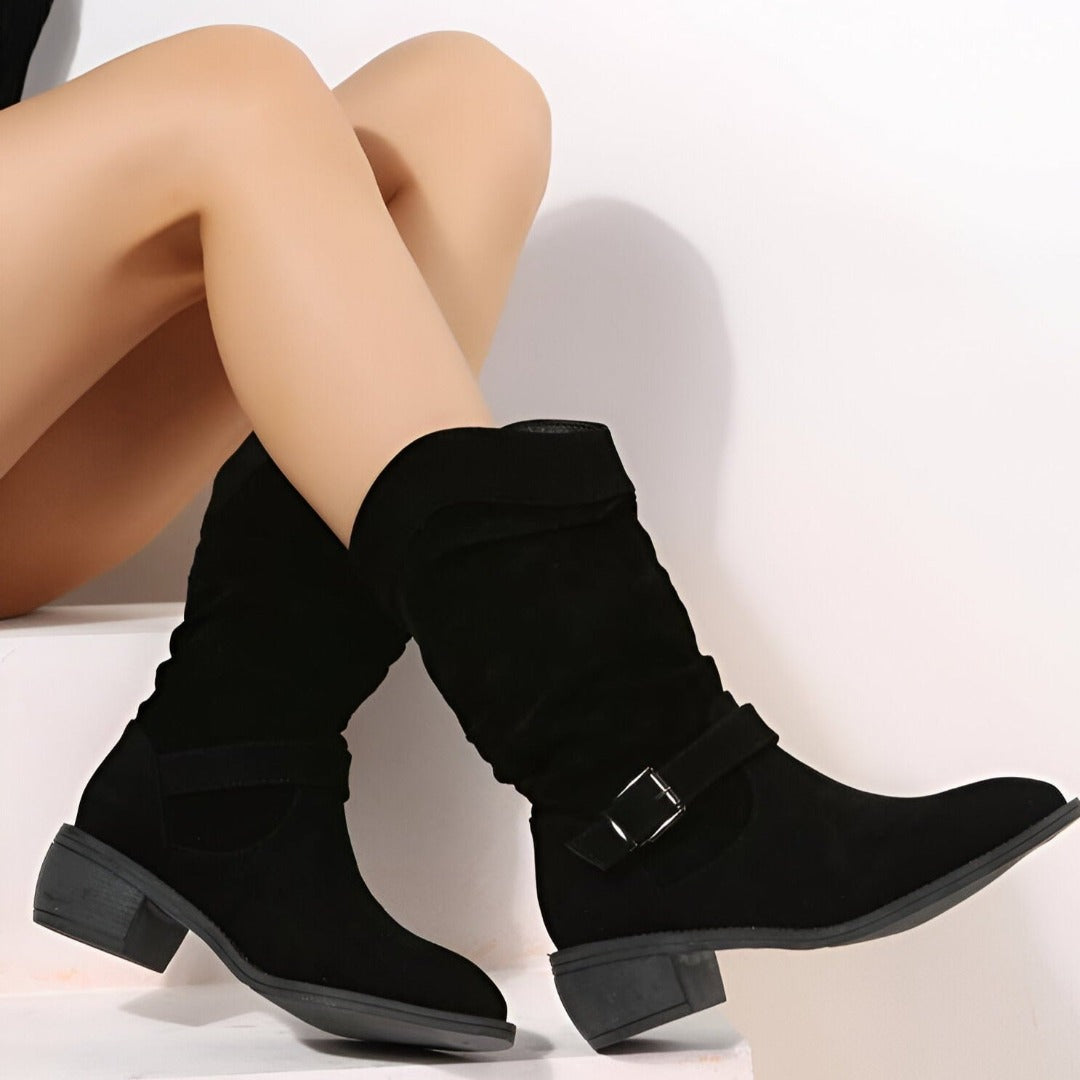 Soft slouchy women's ankle boots. Low heel, adjustable buckle strap for a casual, comfortable fit.