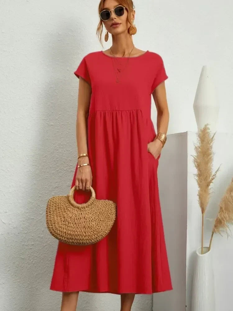 Women's smock waist short sleeve maxi dress, perfect for casual summer wear and everyday comfort.