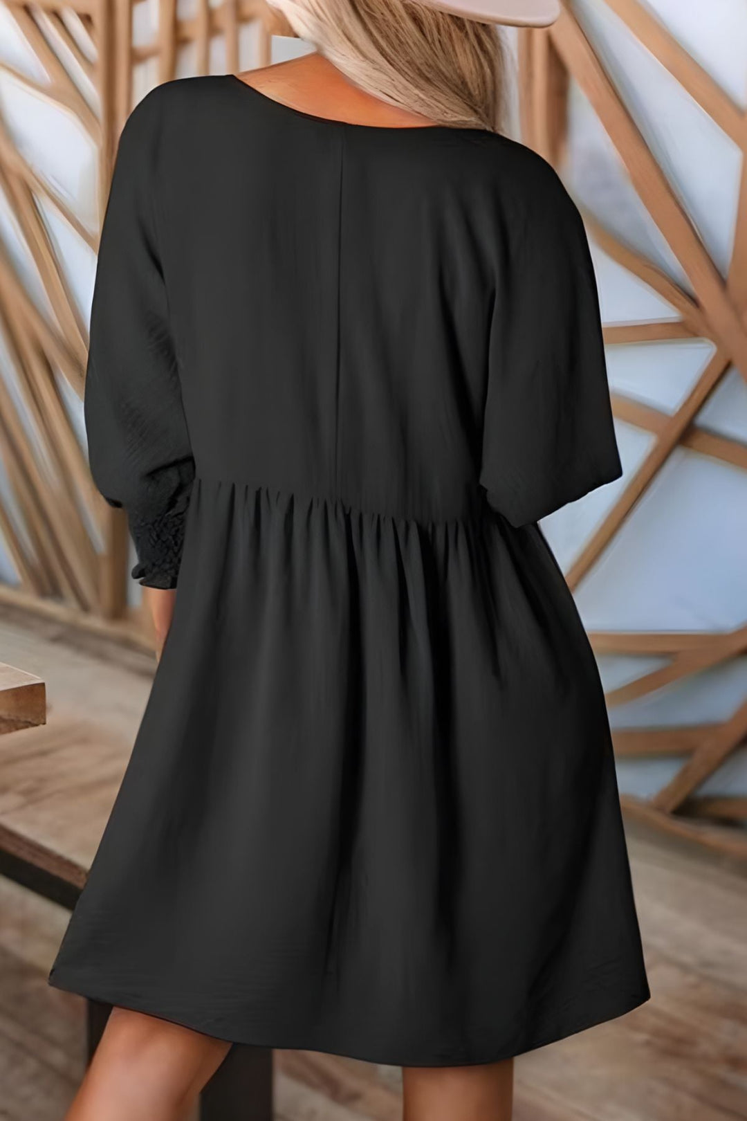 Shop women's versatile babydoll mini dress with smocked half sleeves and stylish ruffle accents.